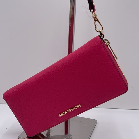 MICHAEL KORS
Leather Continental Wristlet Phone Case Wallet 
Electric Pink 
NWT - Picture 1 of 16